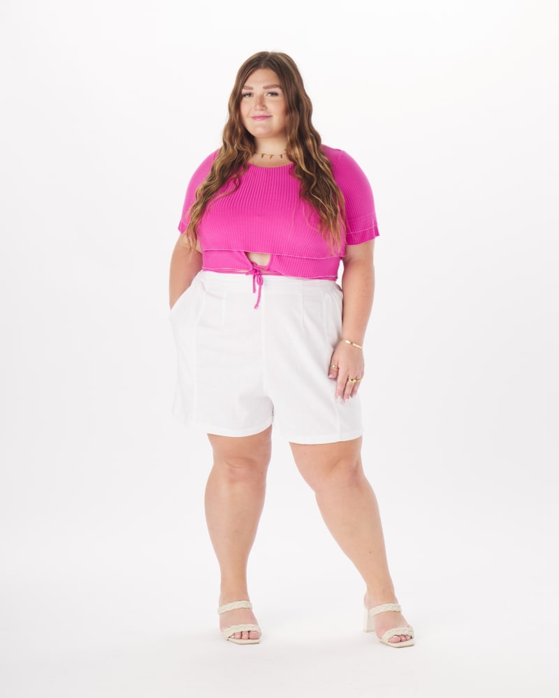 Front of a model wearing a size 2X Dominique Tie-Around Crop Top in Black in Deep Fuchsia by What Lo Wants. | dia_product_style_image_id:237994